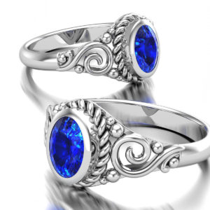 Women's Ring with large oval stone and spirals
