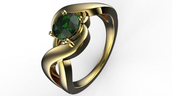 Swirl pattern ring with emerald